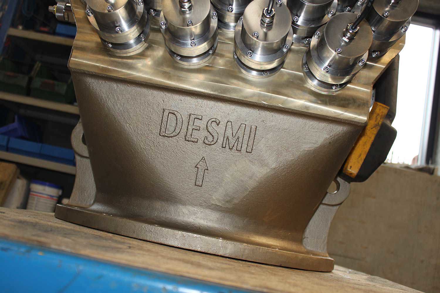 DESMI industrial equipment with multiple valves for fluid handling applications.